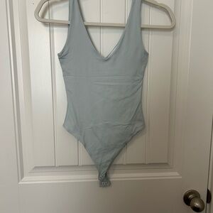 Elegant Light Blue Bodysuit for Women
